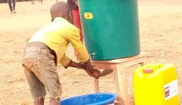 Boy in Burundi washing his hands as a precaution for COVID-19_Burundi_WarChild_Emergency Response_201007