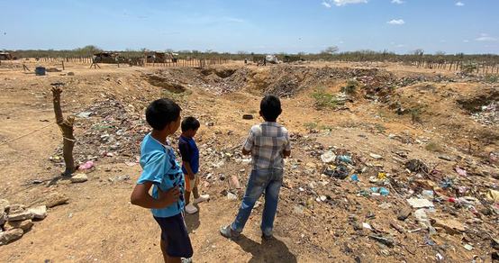 Boys in La Guarija_informal settlement Colombia_outside_ trash belt_War Child_200408.jpg