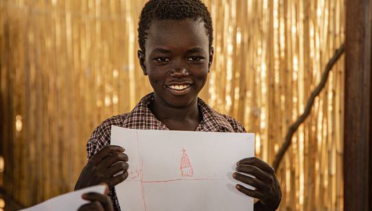 Sudanese boy with drawing_Safe Space_War Child Sudan_200304