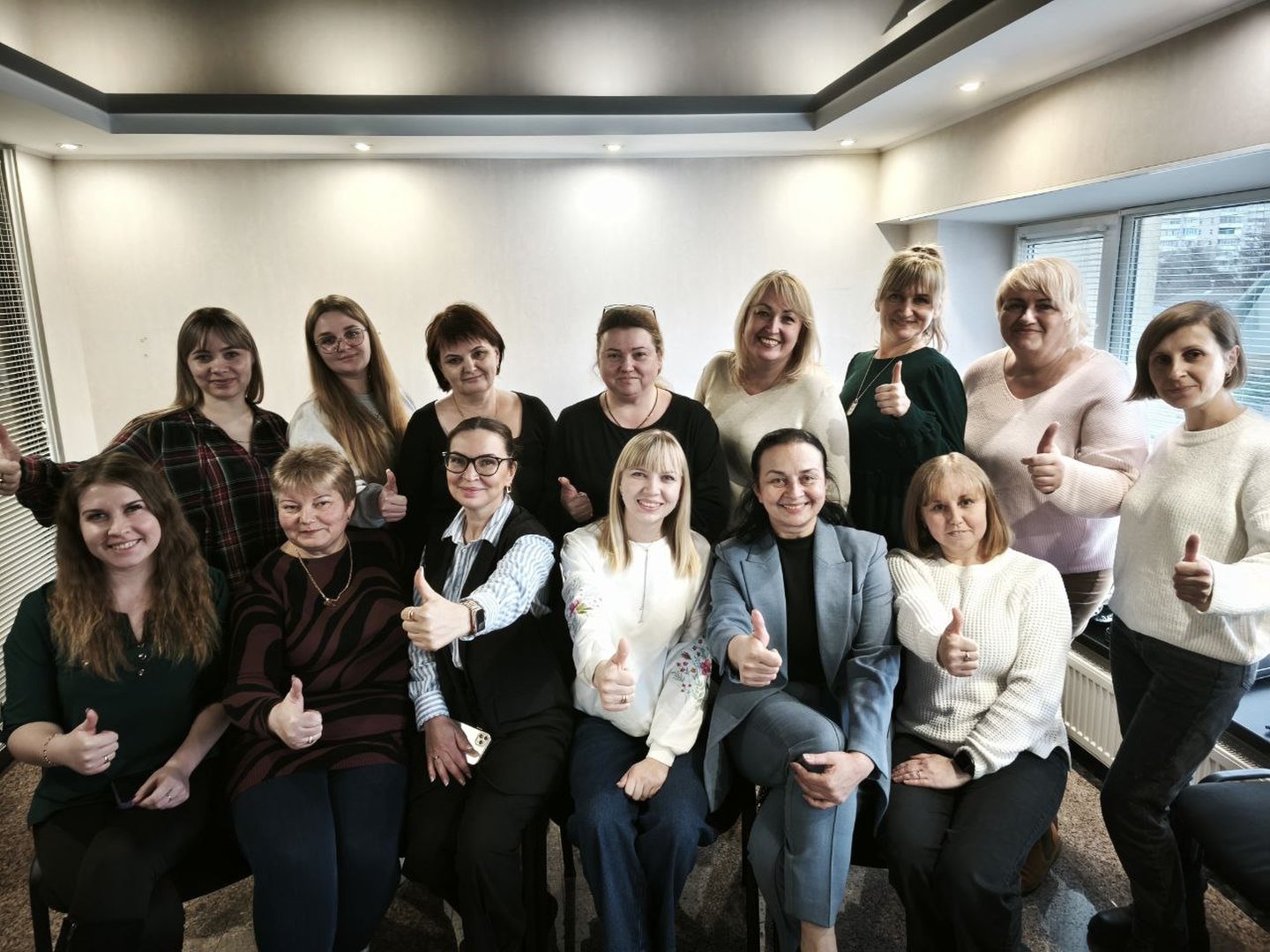 Teachers of intervention schools and Oksana (second from right, bottom), after learning how to implement the Can’t Wait to Learn Ukraine programme.